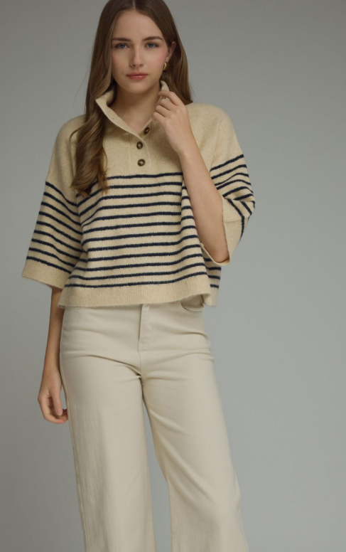 Striped 3/4 sleeve knit top with mock neck, button placket at front, and ribbed trim in cream and navy