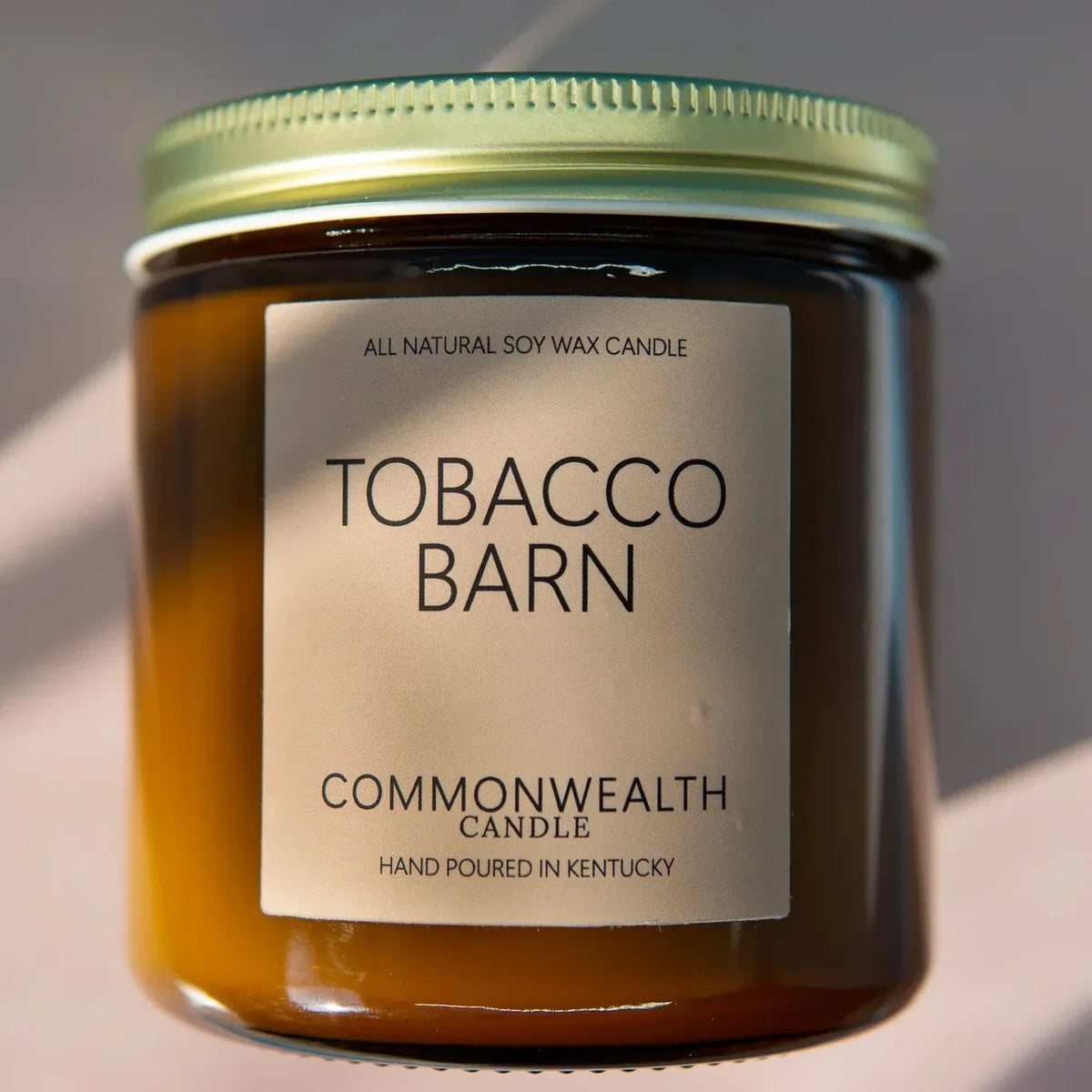 Rich, warm, and surprisingly clean — the Tobacco Barn candle fills any room with the scent of sweet green tobacco leaves, amber, tonka bean, and vanilla in a way that feels cozy without being heavy.