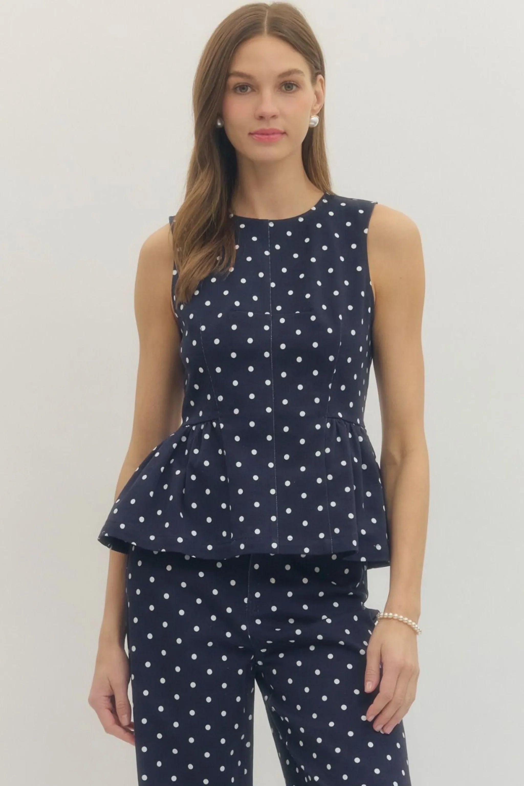 Polka Dot Peplum Top in Navy - Surprise Lily