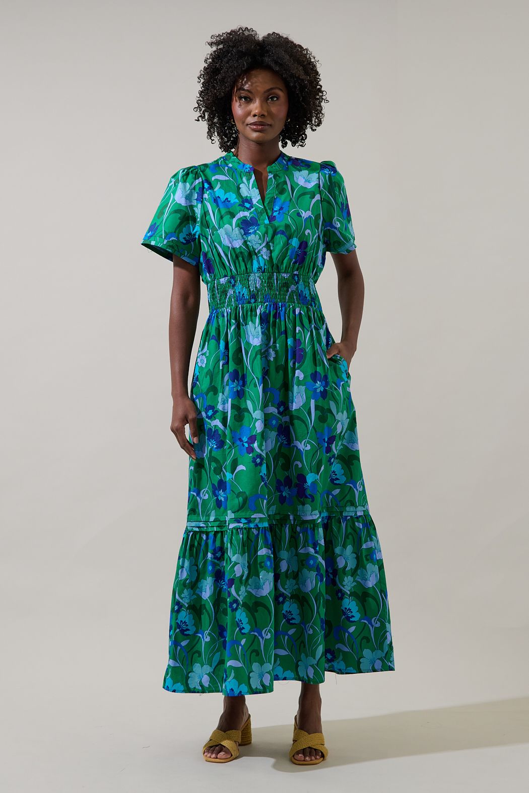 Woman wearing a green floral dress 