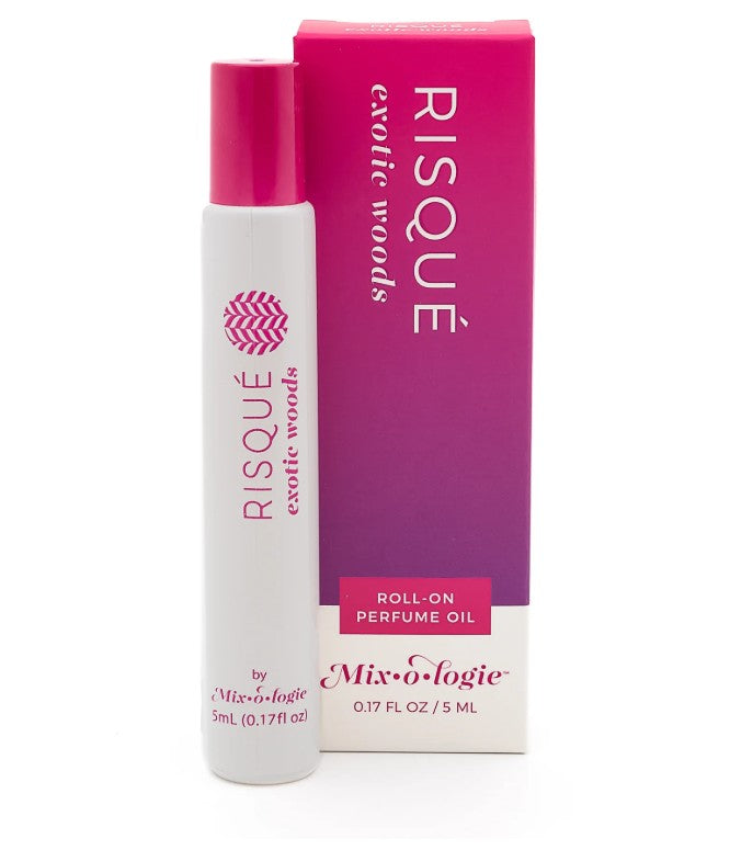 Risque exotic woods roll-on perfume oil with packaging on a white background
