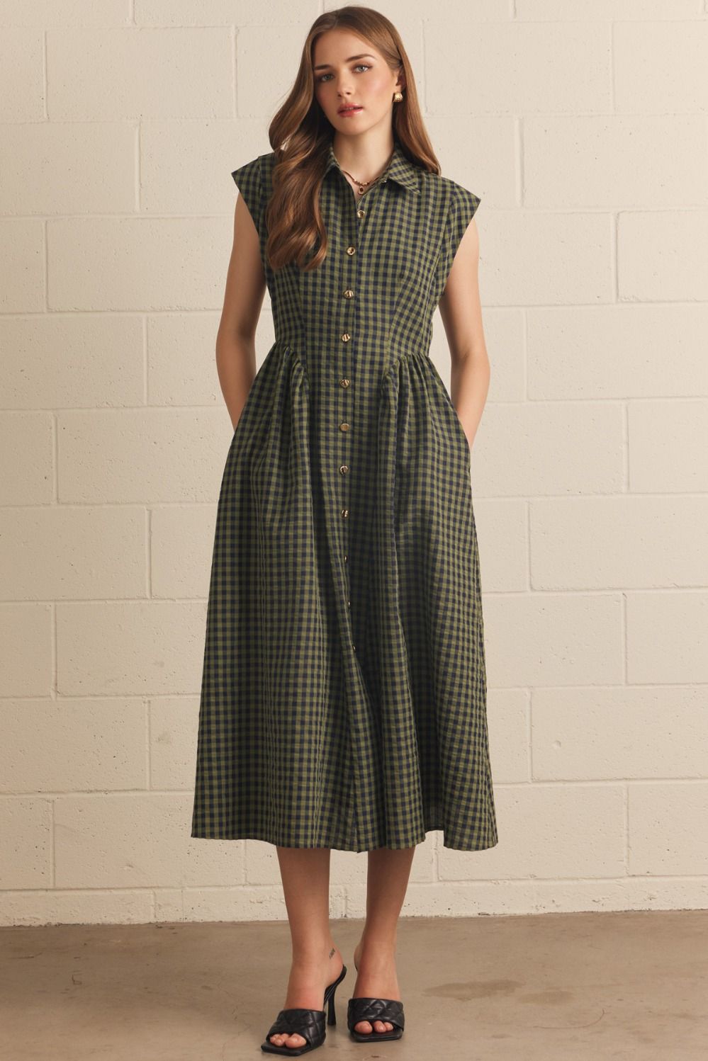 Olive and charcoal gingham collared midi dress with extended cap sleeves, gold-tone button-front closure, A-line skirt, side pockets, and lined construction.