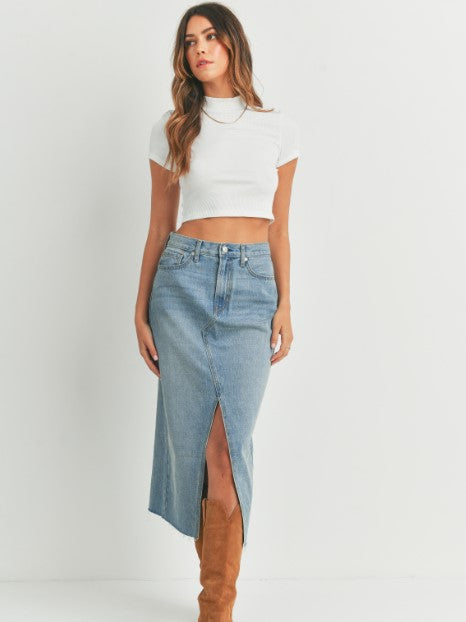 Traditionally casual denim gets a refined update in this light-wash cotton midi skirt designed with a unique front slit.