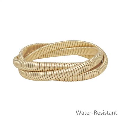 A beautiful gold bracelet with an elegant spiral design, perfect for adding a touch of sophistication to any outfit.